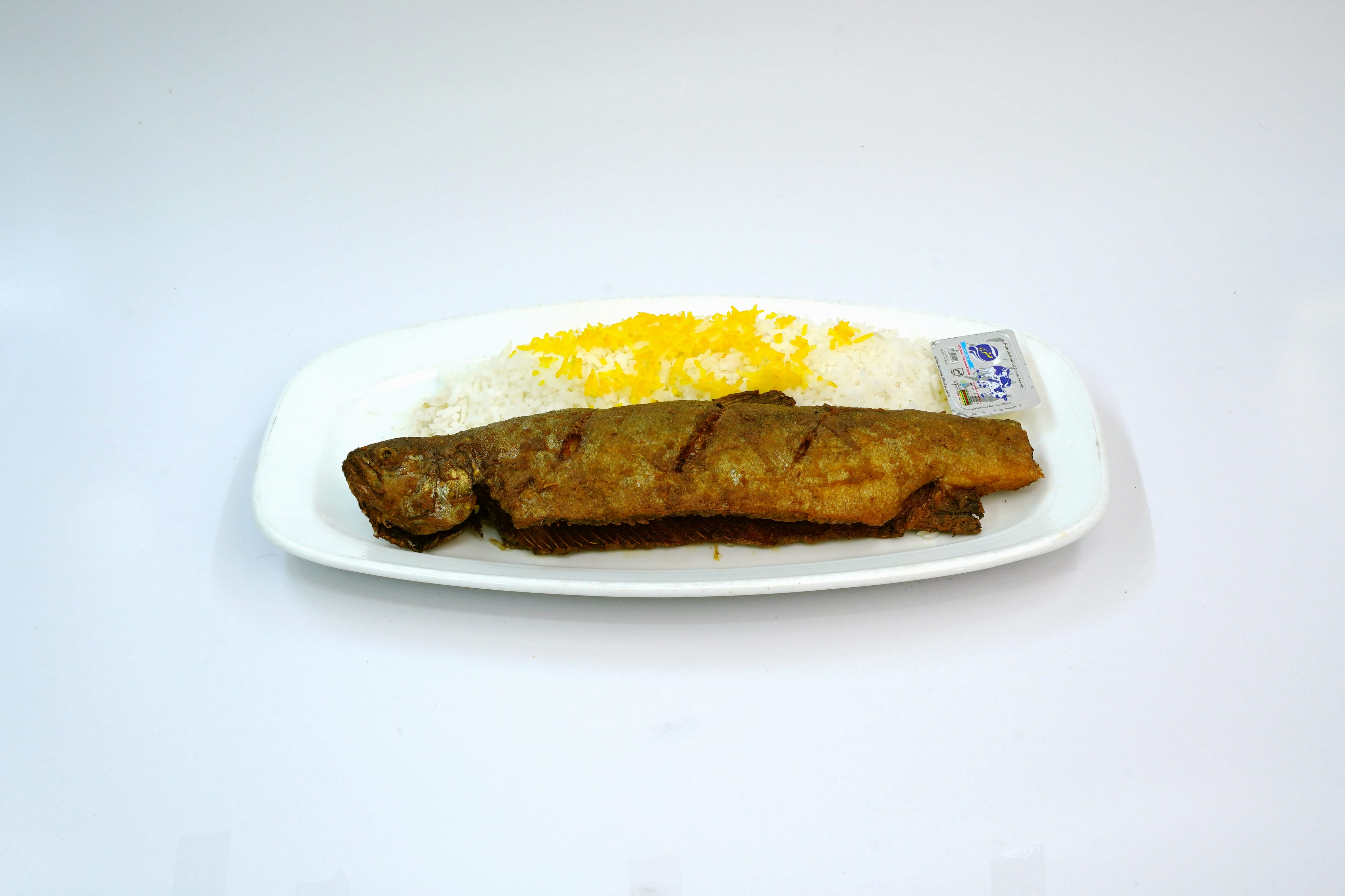 چلو ماهی قزل الا سرخ شده